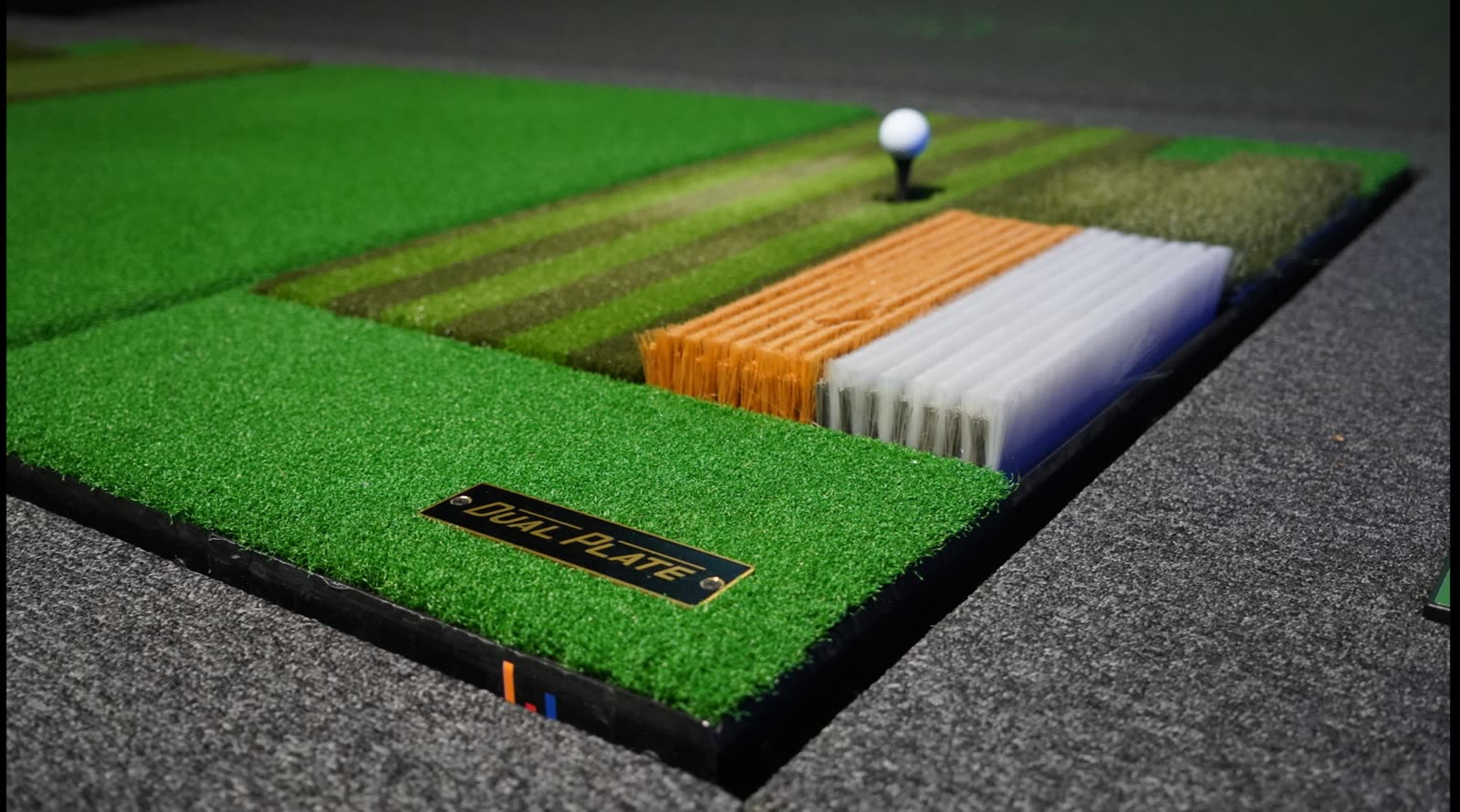 Dual Plate hitting surface on the Golfzon simulator floor